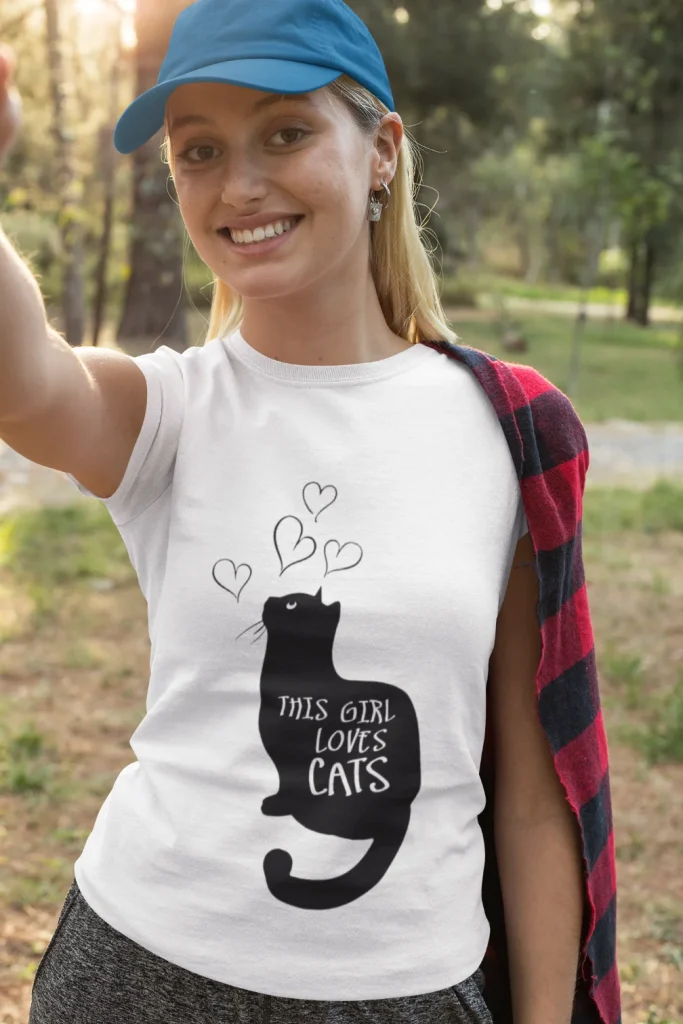 model wearing white t-shirt with black cat fun design