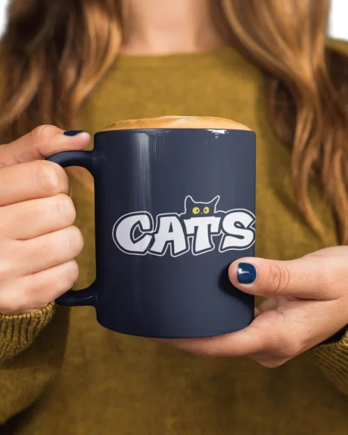 model holding white ceramic mug with void cat design